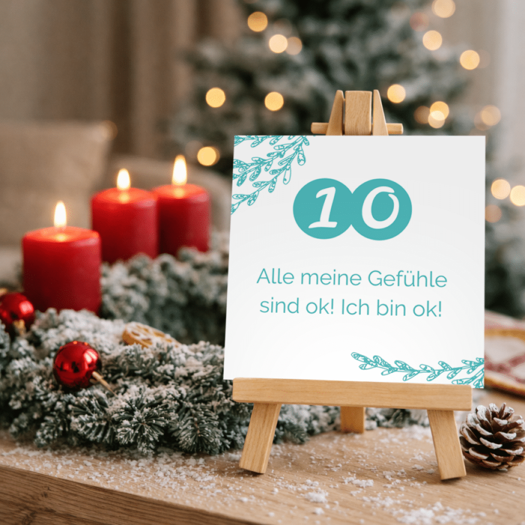 Achtsamkeitskarte Nr. 10 aus dem positiven Adventskalender vor einem weihnachtlichen Adventskranz